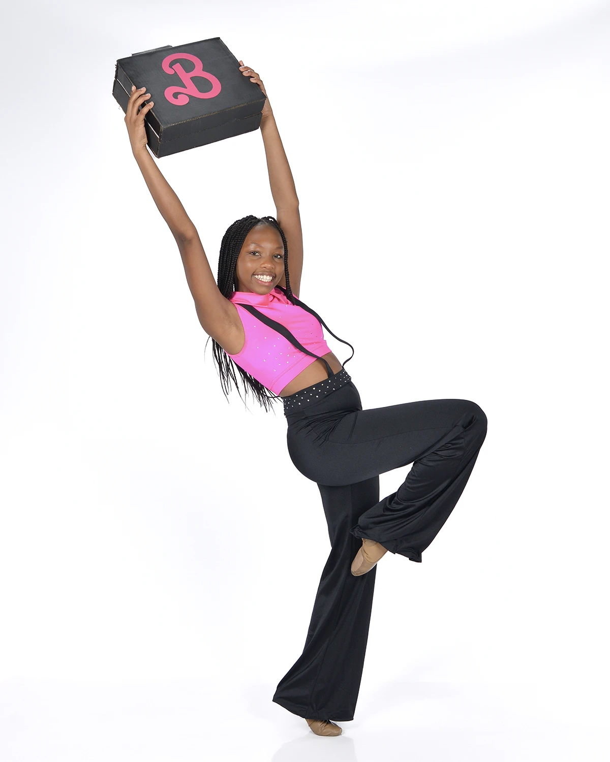 Young dancer in pink and black